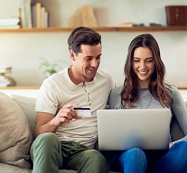 couple with credit card paying payment