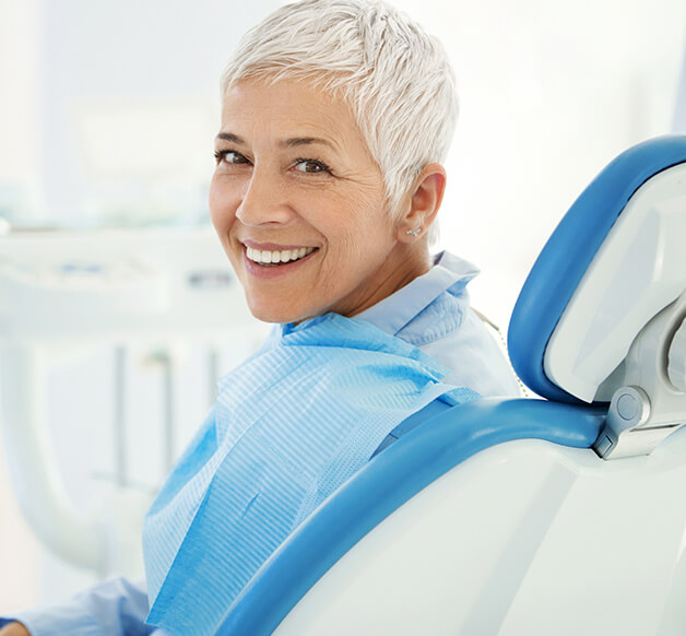 woman at the dentist smiling