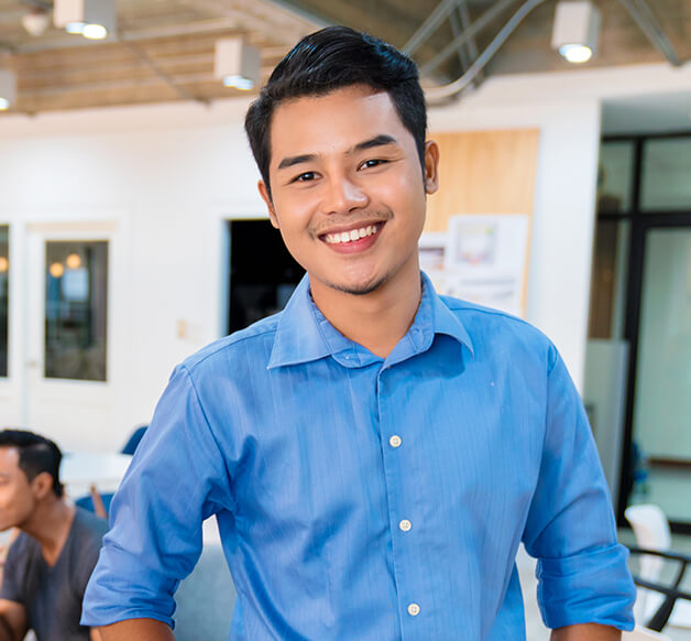 smiling young man at the office