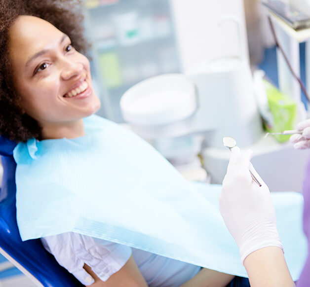 woman about to undergo a dental exam