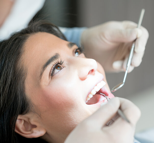woman receiving a dental exam