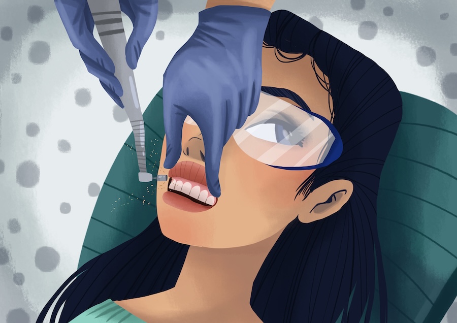 woman getting professional cleaning and exam